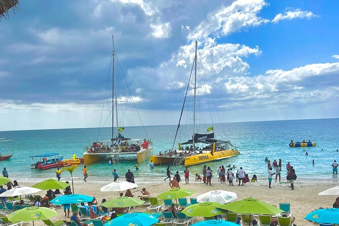 7 Mile Beach Party Catamaran Cruise with Snorkeling & Ricks Cafe - Quick hits before you go