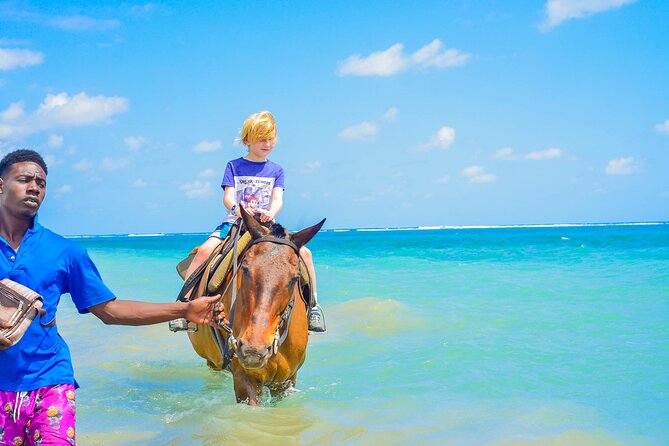 Aqua Fun Tours Dunns Falls, River Tubing and Horse Back - White River tubing, the gentle rapids and tropical shade