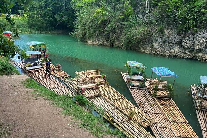 ATV, Bamboo Rafting, and Horseback Ride Tour From Montego Bay - White River bamboo rafting on a handcrafted 30ft raft