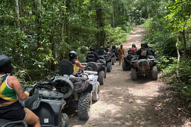 ATV Bamboo Rafting and Horseback Riding in Montego Bay - Bamboo rafting with limestone foot massage, the calm middle