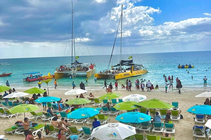 ATV Ride, Negril 7 mile Beach Catamaran Cruise & Ricks cafe Combo - Party catamaran cruise to Rick’s Cafe: snorkeling, DJ, and unlimited mixes