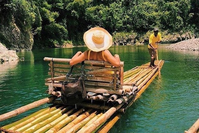 Authentic Jamaican Bamboo Rafting Tour from Montego Bay - Captain-led rapids with a real teamwork moment