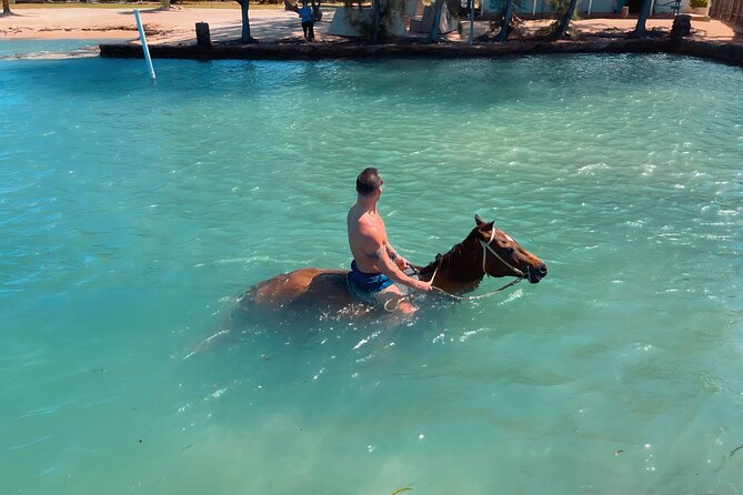 Bamboo Rafting & Horseback Ride n Swim Guided Tour In Montego Bay - Stop at Scotchies: a real Jamaica-style food break
