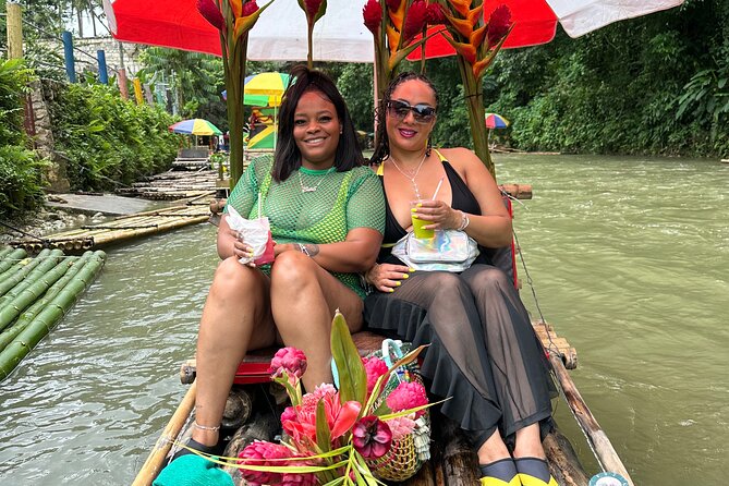 Bamboo Rafting, KFC stop and Souvenir Shopping with Transport - Bamboo rafting on calm water near Montego Bay