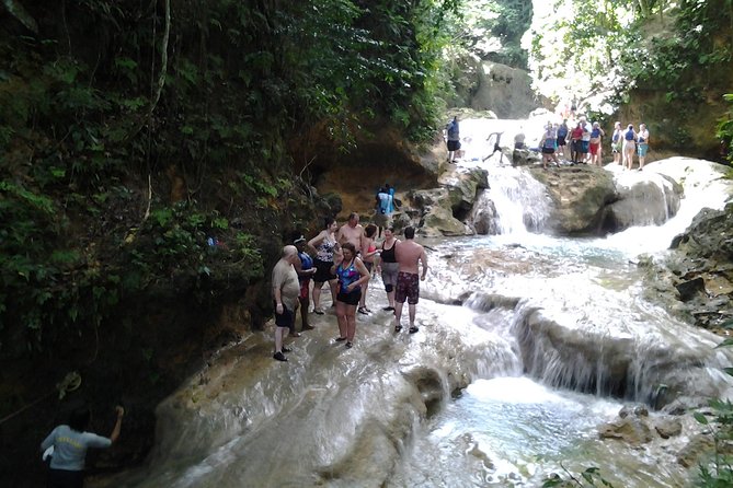 Blue Hole and River Tubing from Montego Bay - Lunch at a jerk spot and a craft market stop