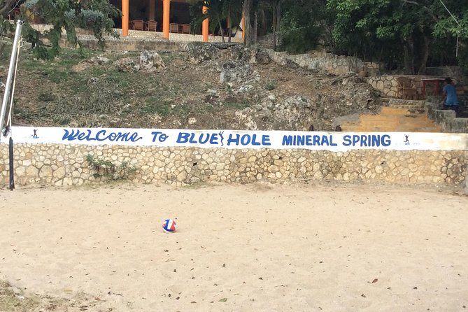 Blue Hole Mineral Springs, Rick's Café, and Shopping Combo Tour - Rick’s Cafe: sunset time, food, and cliff jumping vibes