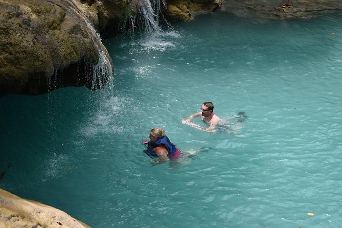 Blue Hole plus Secret Falls & Dunn's River Falls from Grand Palladium - Columbus Park and Runaway Bay: a scenic pause while you’re on the move
