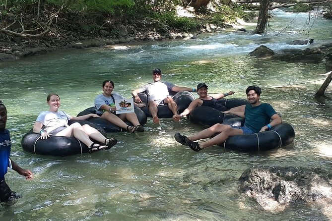Blue Hole Secret Falls and River Tubing Private Tour - White River tubing: rainforest drift plus Class II rapids