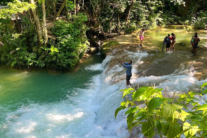 Blue Hole Waterfalls and Bamboo Rafting with Transportation - Blue Hole Secret Waterfalls: calm nature first, then the action