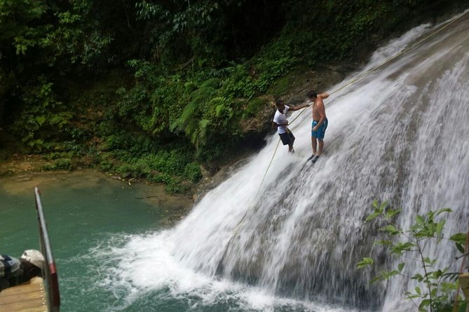 Blue Hole Waterfalls Tour from Falmouth - Stop 1 at Blue Hole: Rope Swings, Zip Lines, Caves, and Jump-In Fun