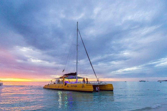 Catamaran Cruise Full Day Tour to Reef, Caves and Negril Beach - Rick’s Cafe sunset: what you actually get near the 35-foot cliff