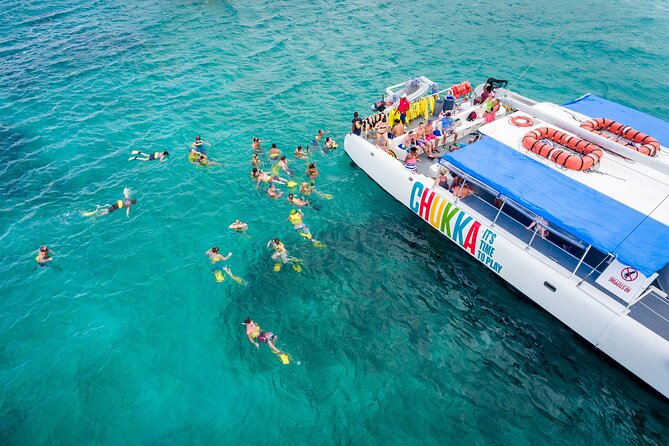 Catamaran Cruise with Snorkeling and Dunn's River Falls - On Board the 65-Foot Catamaran: Vibes, Shoes, and Rum Punch