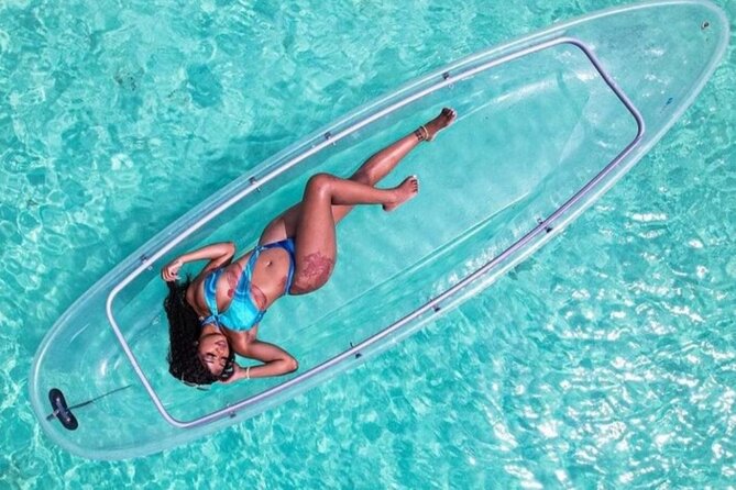 Clear Kayak Photo Shoot and Video In Montego Bay - Drone overhead and posing help: making photos feel easy