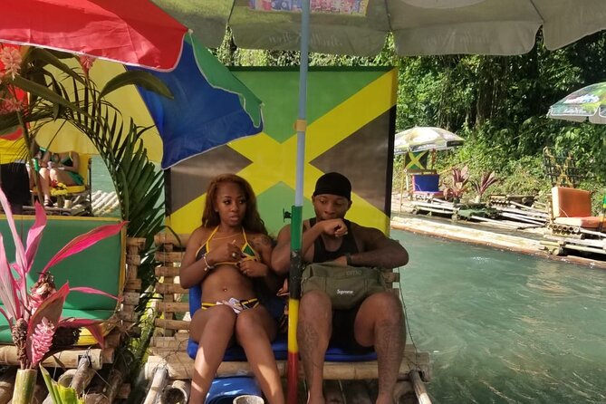 Customized Bamboo Rafting Limestone Massage with Coconut Water - On the bamboo raft: music, dancing, and captain steering