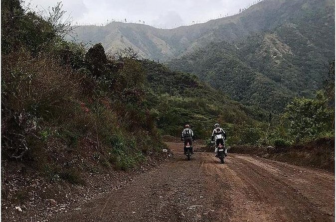 Dirt Bike Tours - The route payoff: coffee plantations, rivers, waterfalls, and big vistas