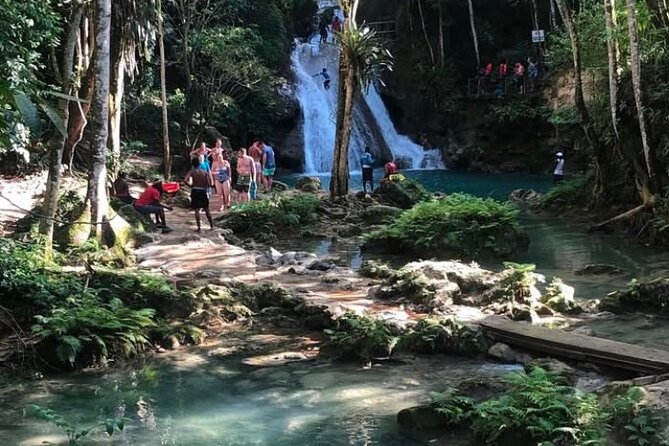 Dunn's River Falls and Blue Hole Tour Ocho Rios from Montego Bay - Dunn’s River Falls: the human chain climb, pools, and the water massage