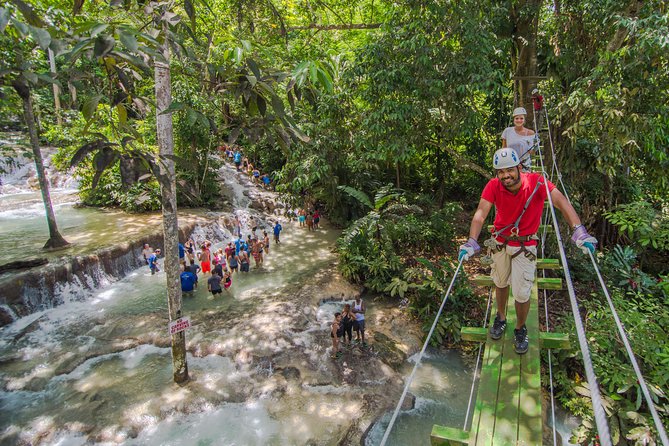 Dunn's River Falls and Zipline (Over the Falls) Adventure Tour from Ocho Rios - Entering Dunn’s River Falls and getting set up for the zipline