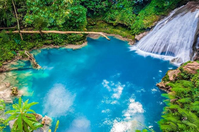 Dunn's River Falls, Blue Hole, Bamboo Rafting, Horseback Combo - The real draw: a tight 5 to 6 hour hits-everything day