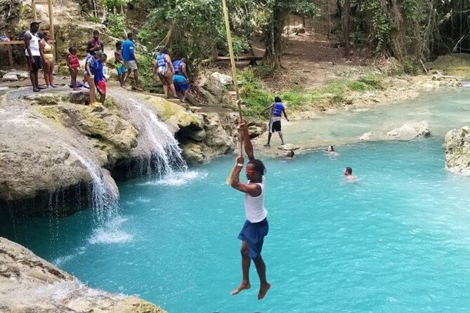 Dunn's River Falls, Blue Hole, Bamboo Rafting, Horseback Combo - White River bamboo rafting: 50ft float with a captain’s entertainment