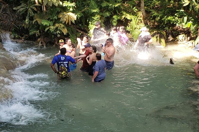 Dunn's River Falls Half Day Tour From Montego Bay - What the guides do that makes the climb easier