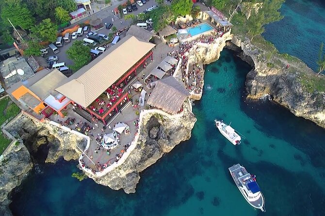 Experience Negril Seven Mile Beach & Jamaica's Famous Ricks Café - Rick’s Cafe Sunset: Music, Cocktails, and Cliff Jump Entertainment