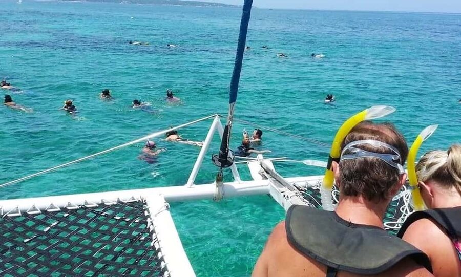 From Falmouth/Ocho Rios: Negril Beach and Catamaran Cruise - Margaritaville and souvenir shopping, quick and practical