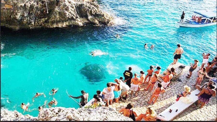 From Montego Bay: Negril Day Trip and Rick's Café Sunset - Negril stop: Seven Mile Beach time, swim options, and local snack breaks