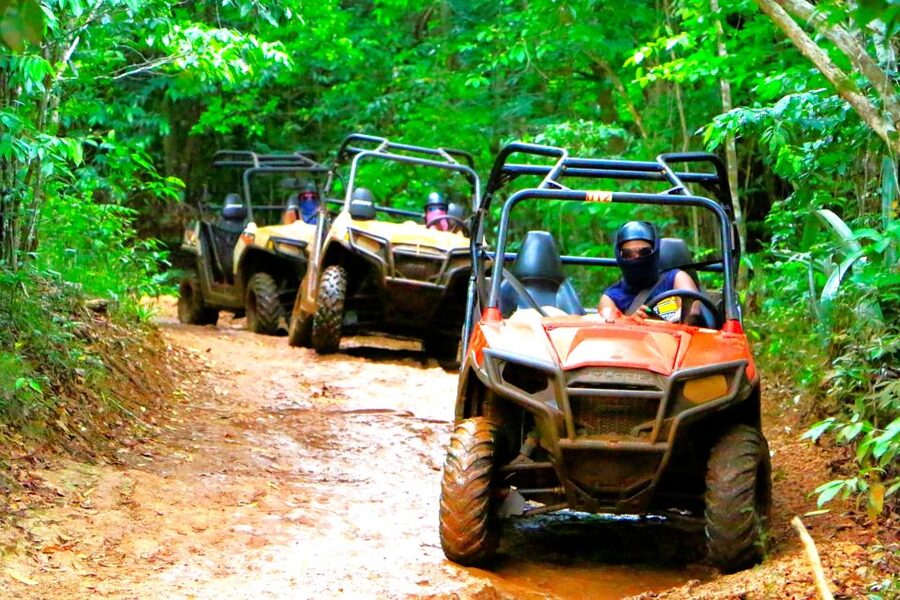 From Runaway Bay: Off Road Vehicle Adventure Tour - ATV helmets on, engines ready: what riding feels like