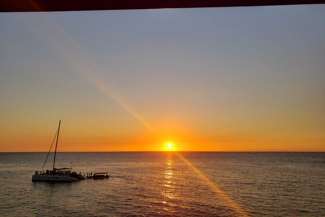 Full-Day Negril & Ricks Cafe Sunset Tour from Montego Bay - Rick’s Cafe: Sunset Views, Food and Drinks, and Cliff Jumping