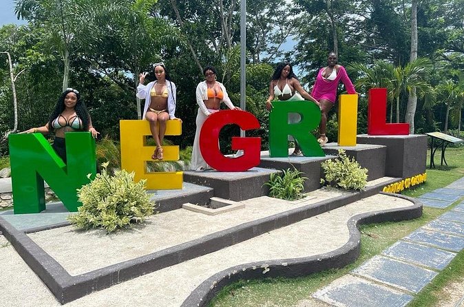 Full Day Tour of Negril Beach: Margaritaville & Rick's Cafe Live - Rick’s Cafe, ocean views, DJ music, and cliff jump style fun