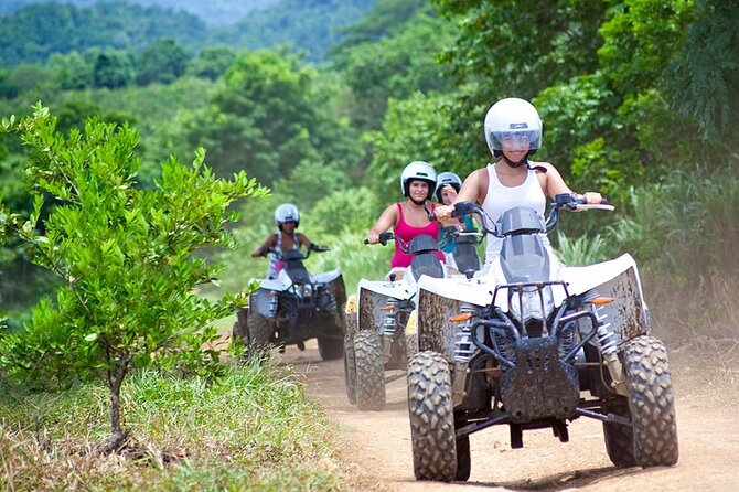 Horseback Ride ATV and Bamboo Rafting Tour Ocho Rios in Jamaica - White River bamboo rafting: rapids, wildlife spotting, and swim time