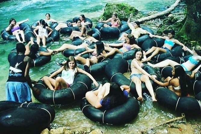 Horseback Ride, Blue Hole, Secret Falls, River Rafting & Tubing - White River tubing: rainforest calm plus a couple of Class II rapids