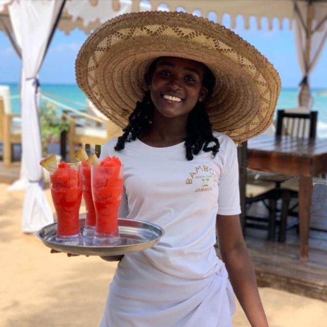 Montego Bay: Dunn's River Falls & Lunch at Bamboo Beach Club - Bamboo Beach Club: Beach Chairs, Reggae Music, and Swimming Time