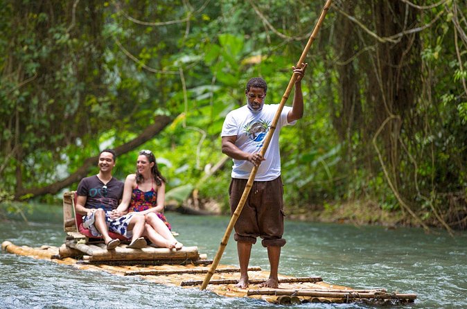 Montego Bay Highlight and Shopping Tour With Bamboo River Rafting - Hip Strip on Jimmy Cliff Boulevard: shopping, Margaritaville, and ocean views