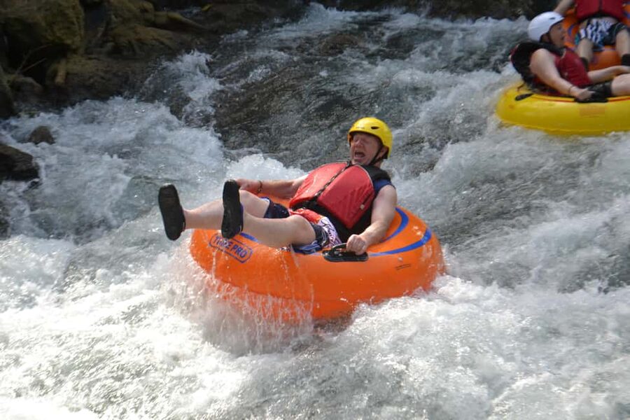 Montego Bay: Jungle River Tubing and Bamboo Beach Club Trip - Jungle River Tubing: what happens once you hit the water