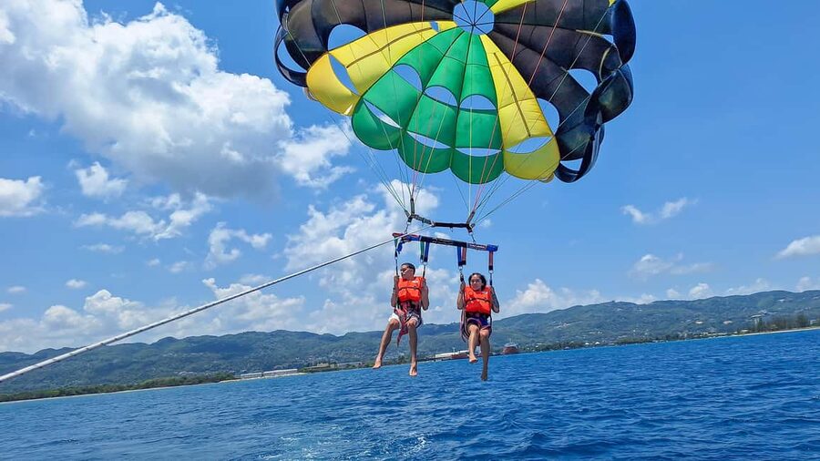 Montego Bay: Parasailing and Jet Ski Combo with Pickup - Parasailing over Montego Bay: 10 minutes in the air, harnessed and guided