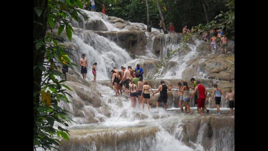 Montego Bay: River Rafting and Dunn's River Falls Day Trip - Rio Nuevo bamboo rafting: calm water, rainforest time