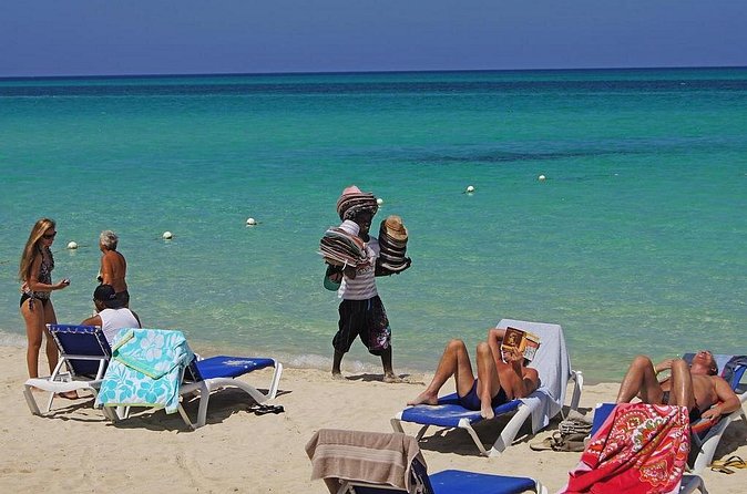 Negril 7 Mile Beach & Rick's Café Combo Tour from Montego Bay - Included tickets and mobile convenience, without extra fuss