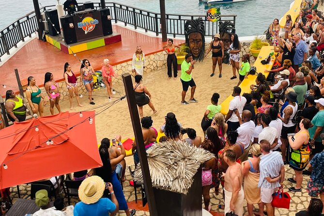 Negril Glass Bottom Boat Tour+Snorkeling visit Booby cay island - Ricks Cafe: Cliff Jumping Option and Sunset Watching