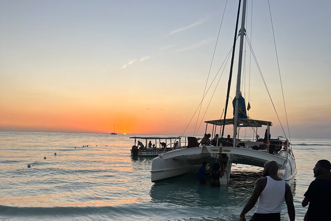 Negril Private Day Tour: ATV Ride, Party Catamaran & Ricks Cafe - Shared Party Catamaran: snorkeling, DJ, and unlimited rum and vodka mixes