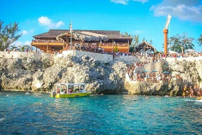 Negril Ricks cruise PLUS Booby Cay Lobster & Cave Snorkeling - Rick’s Cafe by Sea: Sunset Views and Optional Cliff Moments