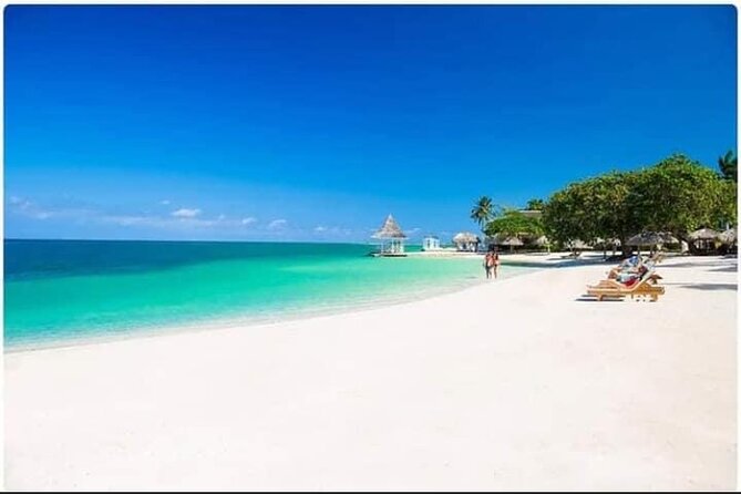 Negril Seven Miles Beach, Snorkeling, Boat Ride, Ricks Cafe Combo - Margaritaville stop: entertainment, shopping, and an easy beach reset