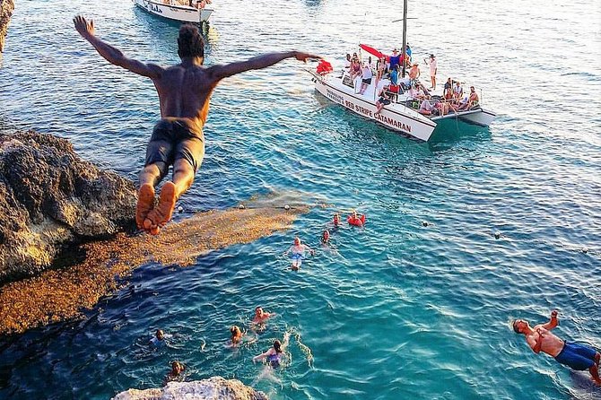 Negril Sunset Trip to Rick's Cafe from Montego Bay and Grand Palladium - Watching cliff-jump performances, plus optional jumping