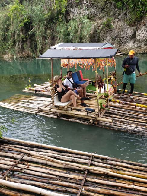 Ocho Rios Jamaica: River Bamboo Rafting Activity - Bamboo rafting in Ocho Rios, with coconut water and limestone magic