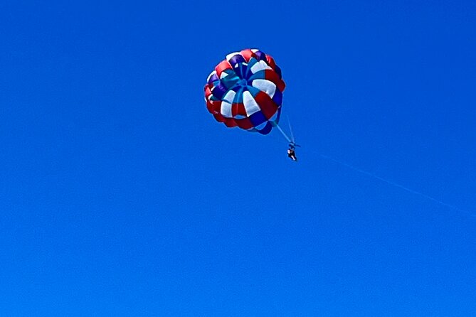 Parasailing above Turquoise Ocean Waters in Montego Bay - After You Come Down: Beach Time And Why It’s Part Of The Value