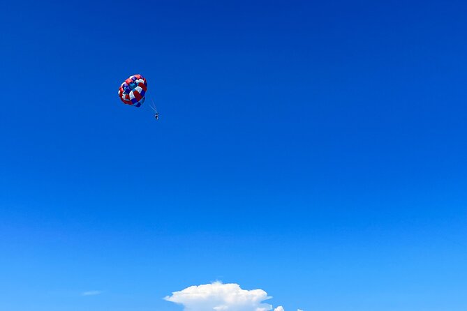 Parasailing above Turquoise Ocean Waters in Montego Bay - What To Bring: Small Items That Make A Big Difference In Comfort