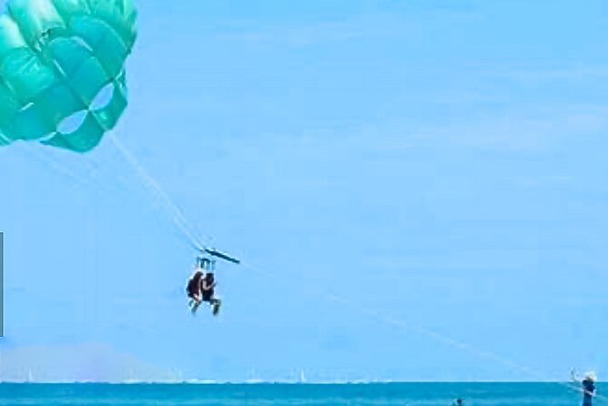 Parasailing above Turquoise Ocean Waters in Montego Bay - Turquoise Skies, Montego Bay Timing, And What The 30 Minutes Feels Like