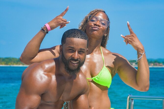 Party Catamaran Sunset Ricks Cafe Negril Open Bar and DJ - Stop 2: Negril and Margaritaville, beach time with shops nearby