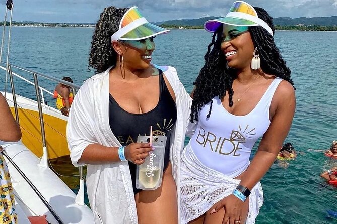 Party Catamaran Sunset Ricks Cafe Negril Open Bar and DJ - Open bar, DJ, and jerk food: the day’s core formula