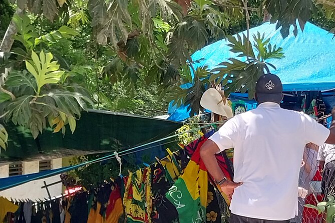Private Bamboo River Raft with Limestone Massage in Montego Bay - The road stops: Hip Strip views, a shopping center, and Wiltshire farm scenery